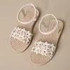 Sandalias de chancla transfronterizas europeas y americanas 2026 para mujer con diseño floral tejido, nuevos zapatos de playa de moda de verano, venta al por mayor europea y americana, talla grande