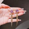Pendientes largos con borlas de cristal y aguja de plata s925 para mujer, nuevos y elegantes pendientes de celebridades de Internet de moda 2022, pendientes redondos para adelgazar la cara.