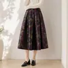 Falda acampanada con estampado en relieve estilo europeo y americano, falda midi de cintura alta línea A, diseño ligeramente abullonado para acentuar la cintura y estilizar las caderas, falda jacquard con patrón intrincado para mujer