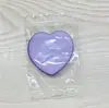 Novo puff de polegar em formato de coração sem pó ovo de beleza atacado úmido e seco mini puff de dedo algodão doce