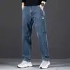 Calça jeans masculina, nova tendência outono e inverno, calça longa elástica reta solta, tamanho grande, calça masculina casual versátil