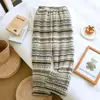 Pantalones de pijama de otoño e invierno para pareja, estilo unisex, forrados de felpa y engrosados, pantalones largos de cuadros, corte holgado, adecuados para uso casual y como ropa de estar en casa.