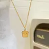 Collar pequeño de pan tostado color dorado para mujer, diseño único, lindo, elegante, dulce, versátil y cadena para la clavícula personalizada