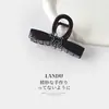 Pinza de Garra para el Cabello con Cola de Caballo Alta de Cachorro con Dibujo Lineal Color Café para Mujer, Pinza de Tiburón de Alto Nivel Nuevo Estilo 2026 Accesorio para el Cabello