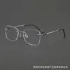 Gafas de titanio puro, modernas y sencillas, sin montura, ultraligeras 5573GR, estilo de diseñador, al por mayor de gafas graduadas hechas a mano en Shenzhen