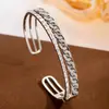 Pulsera y Anillo Abiertos de Cobre Tejido de Gama Alta con Circonita Juego de Dos Piezas Lujo Ligero Francés Conjunto Versátil para el Trabajo al Aire Libre Venta al por Mayor