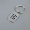 Venta Caliente de Productos Nuevos Transfronterizos 26 Letras Inglesas Huecas de Acero de Titanio Sin Decoloración Accesorios de Joyería Llavero 26 Letras