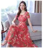01 Vestido de Verão de Manga Curta Transfronteiriço Feminino Europeu e Americano de Manga Curta Elegante Emagrecedor Floral Gola Redonda Comprimento Médio Vestido para Idosos