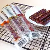 Un Juego de Salchichas Sabor Hokkaido, Tiras Largas, Sabor Barbacoa Picante, Sabor Miel, Sabor Picante, Una Bolsa de 2.5 kg