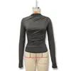 Camiseta de manga larga de color liso, ajustada, plisada, de cuello alto, para mujer, estilo europeo y americano, moda nueva Otoño/Invierno 2024