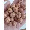 Semillas de núcleo de almohada de melocotón pequeño, cuentas sueltas, semillas sueltas, nuez de montaña pequeña, materia prima, almohada cervical silvestre, relleno de almohada, nuez