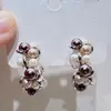 Pendientes de Metal Trenzado Coloridos con Perlas en Forma de C Estilo Francés para Mujer, Diseño Único de Lujo Ligero de Nicho con un Toque de Alta Gama