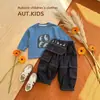 Conjunto de Ropa Interior Básica para Niños 2026 Nuevo Estilo Coreano Niños Estampado de Letras Manga Larga Top Costura de Contraste Pantalones Cargo Conjunto