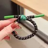 Cuerda para el pelo de cola de caballo alta simple Anillo trenzado de pelo colorido Cuerda para el pelo Nueva banda para el pelo de alta gama para mujer Cuerda para el pelo versátil