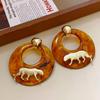 Pendientes de tigre con anillo de resina y aguja de plata, de alta gama, estilo Hong Kong, con diseño exagerado y moderno, al por mayor