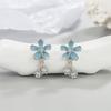 Pendientes de margarita azul grisáceo, pendientes femeninos de diseño de nicho, alta sensación, 2022, nuevos pendientes de temperamento de moda, pendientes de otoño e invierno