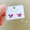 Nuevos aretes pequeños de mariposa de circonita corindón rojo diseño nicho aretes de circonita púrpura aretes de moda coreana