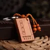 Venta caliente llavero de coche al por mayor caoba Sutra del Corazón llavero colgante escritura llavero regalo JSK03
