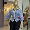 Ropa transfronteriza europea y americana para mujer africana 2026 nueva moda con cuello, huecos, cuadros, mangas de farol, top de diseñador