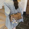 Bolso de hombro para mujer otoño e invierno 2026 nuevo moda coreana de moda bandolera versátil retro bolsa de almohada para debajo del brazo