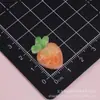 Dibujos animados translúcidos serie de frutas mango maracuyá accesorios de resina pegamento de crema DIY accesorios para el cabello pinzas para el cabello funda de teléfono