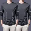 Camiseta casual versátil de manga larga para hombre para otoño, cuello redondo, color liso moderno, cómoda, transpirable y de corte holgado.