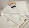Venta al por mayor transfronteriza de conjunto de chaqueta de traje de negocios de manga larga con cuello en V marrón y pantalones de pierna ancha para mujer de otoño e invierno