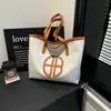 Moda Otoño 2026 Bolso Tote Grande Versátil Elegante Simple Casual Texturizado para Viaje al Trabajo Hombro Bolso de Mano
