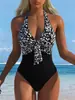 Traje de baño de una pieza europeo y americano para mujer, escote en V profundo, con tiras, ajustado, sexy, con cortes, adelgazante, nuevo estilo 2027, para vacaciones, aguas termales, traje de baño