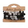 25 Pulseras Populares de Estilo Bohemio Étnico Europeo y Americano Colgante de Mariposa Ancla Elefante Pulsera Elástica Multicapa Venta al por Mayor