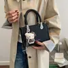 Bolso de mano casual para uso diario para mujer 2026 nuevo elegante de un solo hombro bandolera pequeño cuadrado estilo coreano ins temperamento"""