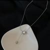 Collar de Cadena de Acero de Titanio con Bola Dorada para Mujer, No se Desvanece, Nuevo Modelo 2026, Estilo Ins de Nicho de Lujo Ligero, Cadena de Clavícula Simple y de Gama Alta