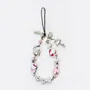 Pulsera de gato lindo Hello Kitty de alta calidad, cordón metálico para teléfono, correa de muñeca, versión de cordón universal, dos colores
