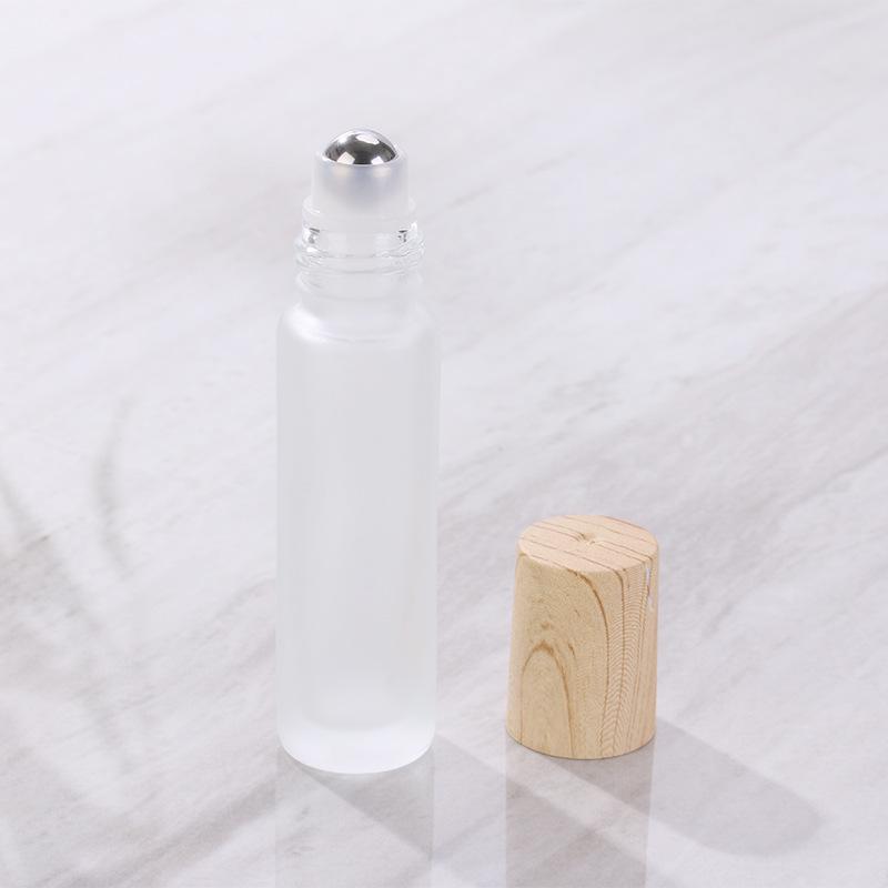 IMG_3355 10ml透明蒙砂滚珠瓶+钢珠+木纹盖