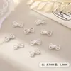 Acessórios de Nail Art Mini Laço Tendência de Celebridade da Internet Transfronteiriça, Decorações de Metal Fina Simples para Unhas Atacado