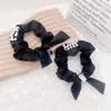 Estilo coreano estilo luxo leve personalidade simples moda padrão ouro tecido acetinado gravata borboleta cabelo feminino Elástico de cabelo grande para intestino cabelo corda de cabelo