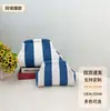 Bolso de mano simple de punto a rayas, bolsa tejida versátil de gran capacidad más vendida, bolso nube de alta gama