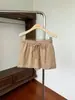 Falda casual de ajuste holgado con cintura elástica para mujer, nuevo estilo de verano, falda corta versátil de línea A con cordón anti-exposición