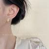 Pendientes de ojo de gato de cristal francés de alta gama para mujer, ligeros, elegantes, de circonita, a la moda, combinables con todo.