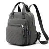 Mochila de Nylon 2026 Bolso de Mano Estilo Europeo y Americano para Mujer Mochila Cuadrada Pequeña Bordada Acolchada para Estudiantes Universitarias