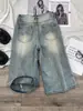 Pantalones cortos de mezclilla rotos geniales estilo callejero americano para hombre, marca moderna con un toque de alta gama, pantalones cropped estilo callejero para parejas