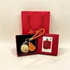 Chaveiro Pingente Dourado do Ano da Ovelha com Decoração em Folha de Ouro Conjunto em Caixa de Presente Personalizado para Negócios Presente Personalizado Atacado