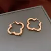 Pendientes Minimalistas de Flor Hueca Moda Ins Pendientes de Alto Temperamento Estilo Minimalista Versátil Nicho Pendientes al por Mayor