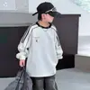 Sudadera de rayas para niño, nuevo estilo otoño 2026, top elegante de manga larga para niños mayores, camiseta básica de otoño, camiseta con bloques de color