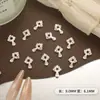 Tendência Nova Arte de Unha em Formato de Cruz com Decoração de Strass, Acessórios de Unha Metálicos DIY, Peças de Unha Usáveis de Liga Metálica Atacado