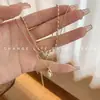 Colar de pérolas com contas redondas para mulheres, estilo frio simples, corrente de clavícula empilhada, nicho de Ano Novo, celebridade da internet de luxo leve