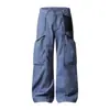 Pantalones de trabajo estilo retro americano con bolsillos grandes, diseñados para un look urbano moderno y casual, con un acabado lavado y desgastado, corte holgado y perneras anchas y rectas