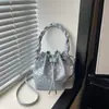 Bolso pequeño plisado de moda para mujer, nuevo bolso tipo cubo simple con cordón de lunares franceses, bolso cruzado popular de verano para el día a día