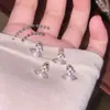 Brincos de Tarraxa com Pingente de Saturno Pérola Zircônia Microincrustada Franceses Delicados Elegantes Titânio de Alta Qualidade Tarraxas para Hélice da Orelha Atacado