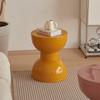 Taburete bajo rojo Xuanni Home Net para el hogar, pequeño apartamento, taburete pequeño de plástico, taburete de diseño simple para cambiar zapatos, taburete creativo redondo